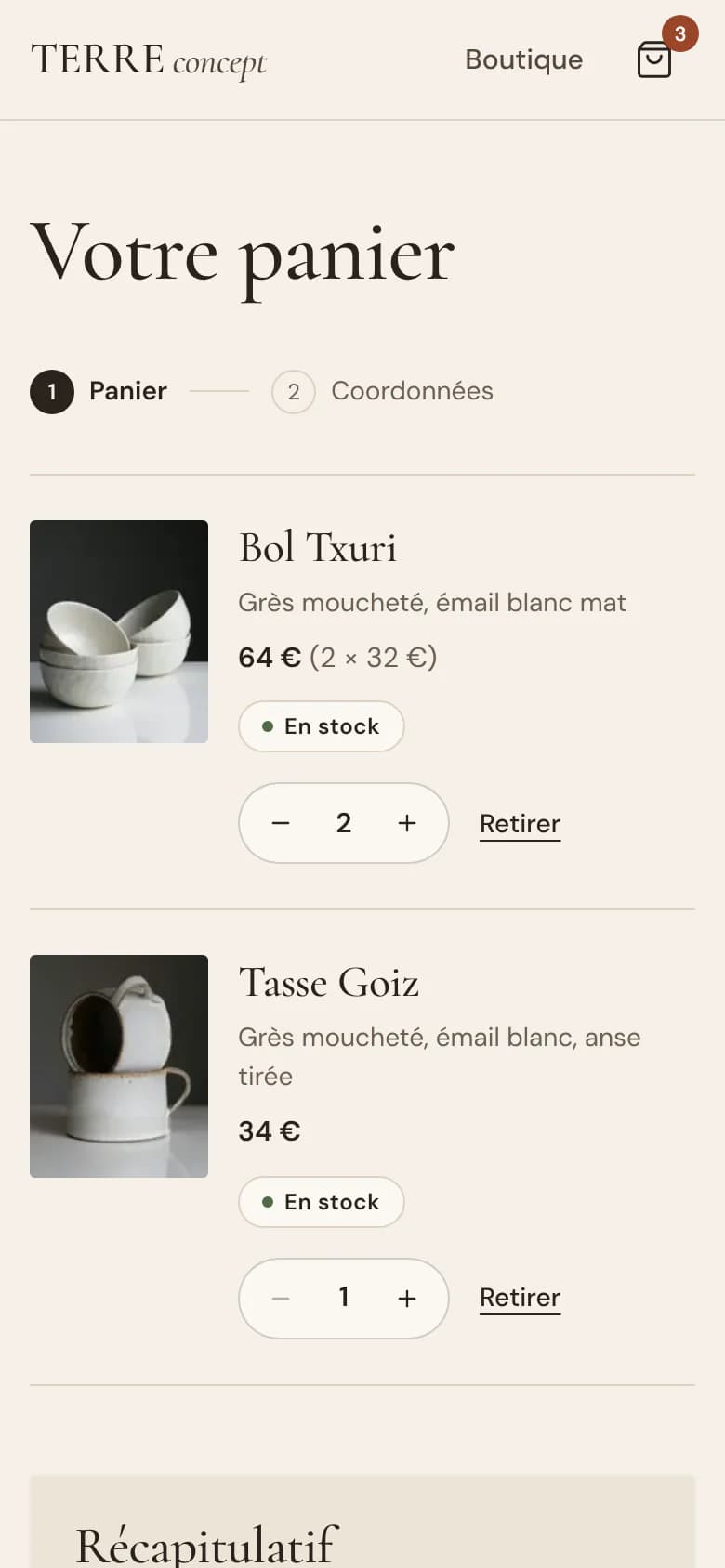 Démonstration fictive : le panier de Terre concept sur téléphone. Deux pièces, un bol Txuri et une tasse Goiz, leurs quantités, et le début du récapitulatif, sans prix.